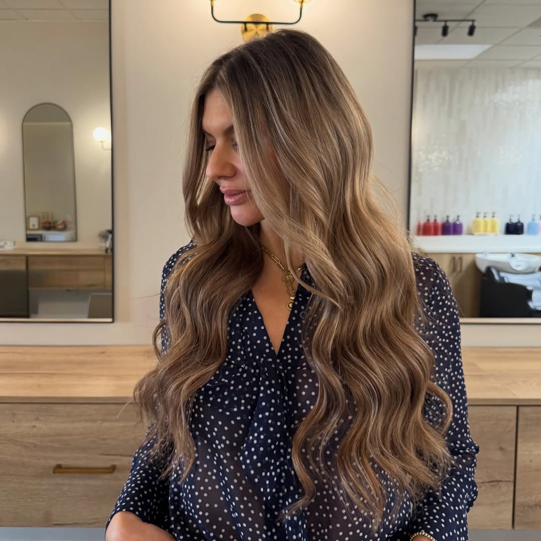 Styling and curling Natural Beaded Row extensions at Kinsley and Mane salon